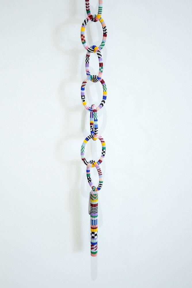 Beaded pen on a long beaded chain